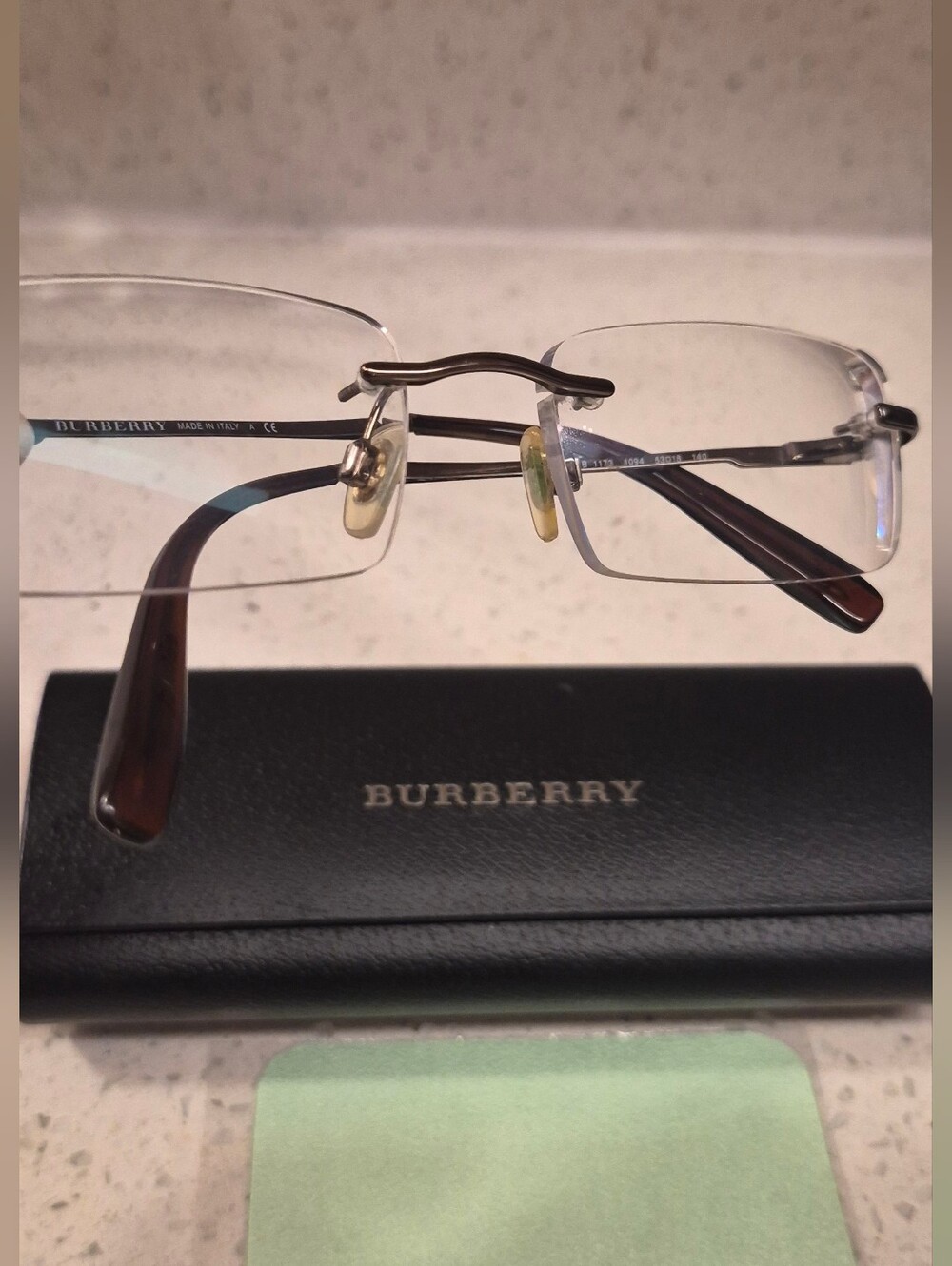 Burberry Rimless Men's Glasses with Brown Temples and Gold Arms